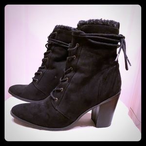 Lace up black suede chunky heel boots.